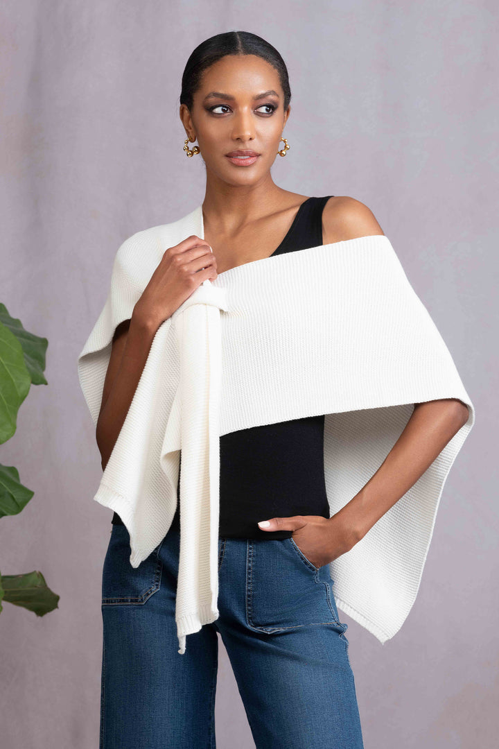 ALISON SHERI Fall 2025 
Its ribbed design and graceful drape add a refined layer of polish, making it a versatile accessory for cooler days. Perfect for sophisticated layering, it combines comfort with timeless modern style.