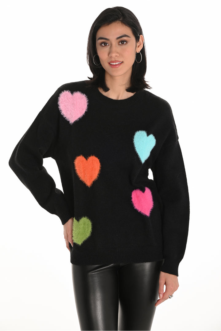 Frank Lyman Fall 2025 
Its relaxed fit makes it an easy staple to mix and match with jeans, joggers, shorts, slim pants, or capris. Perfect for adding a fun pop of colour and softness to any casual outfit this season.