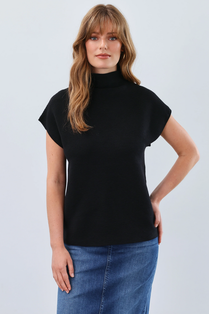 FDJ Fall 2025
This luxurious sweater knit design features chic cap short sleeves and a flattering cowl neck.