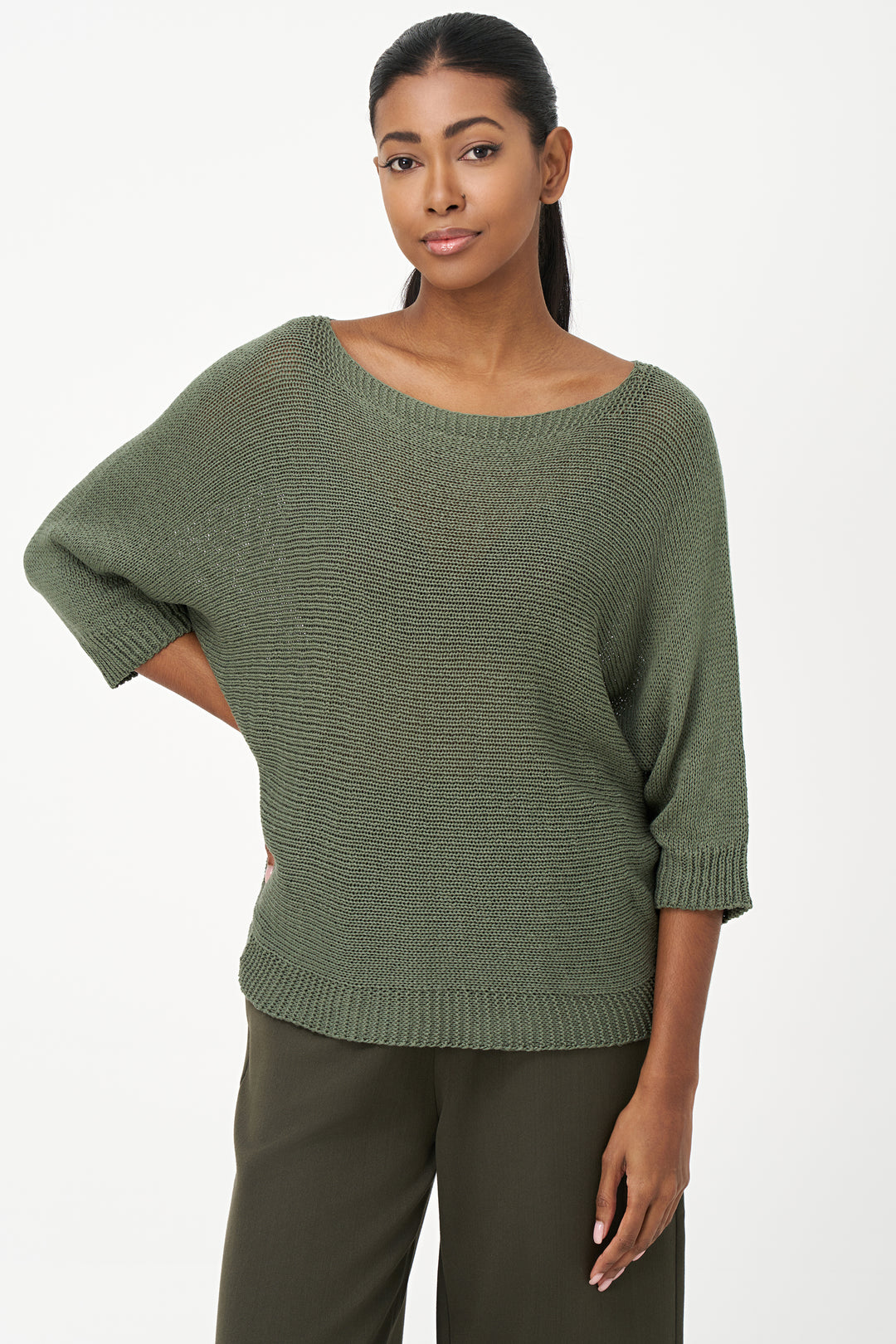 M Italy Fall 2025 
This light sweater top features a delicate crochet fishnet knit in solid colours, offering a lightweight and breathable layer. Crafted from acrylic, its light and loose fit makes it ideal for layering over tank tops, providing comfort and style without bulk.