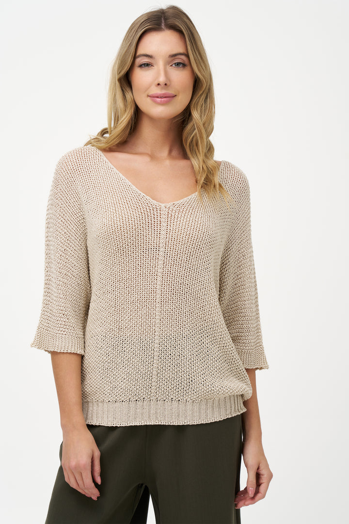 M Italy Fall 2025 
This light sweater top features a delicate crochet fishnet knit in solid colours, offering a lightweight and breathable layer. 