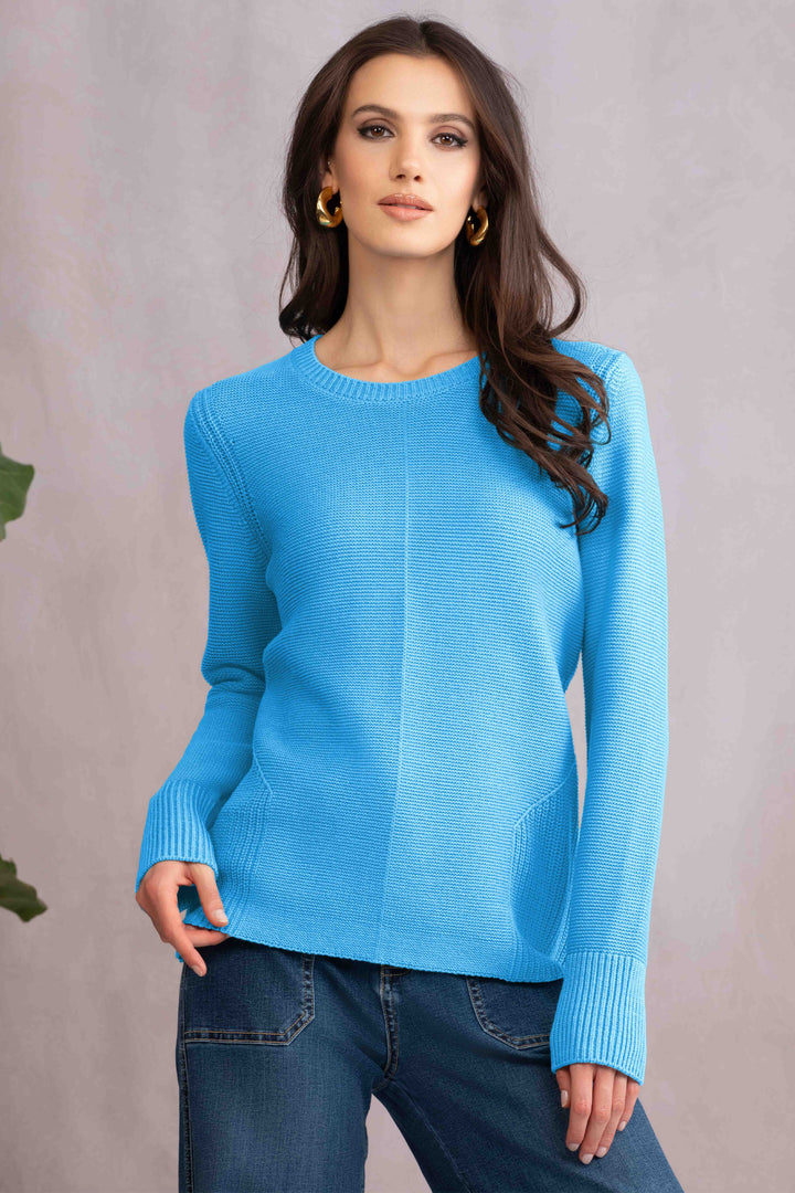 Alison Sheri Fall 2025 
 Crafted from a soft cotton blend, its ribbed pattern and contrast crew neck add subtle sophistication. 