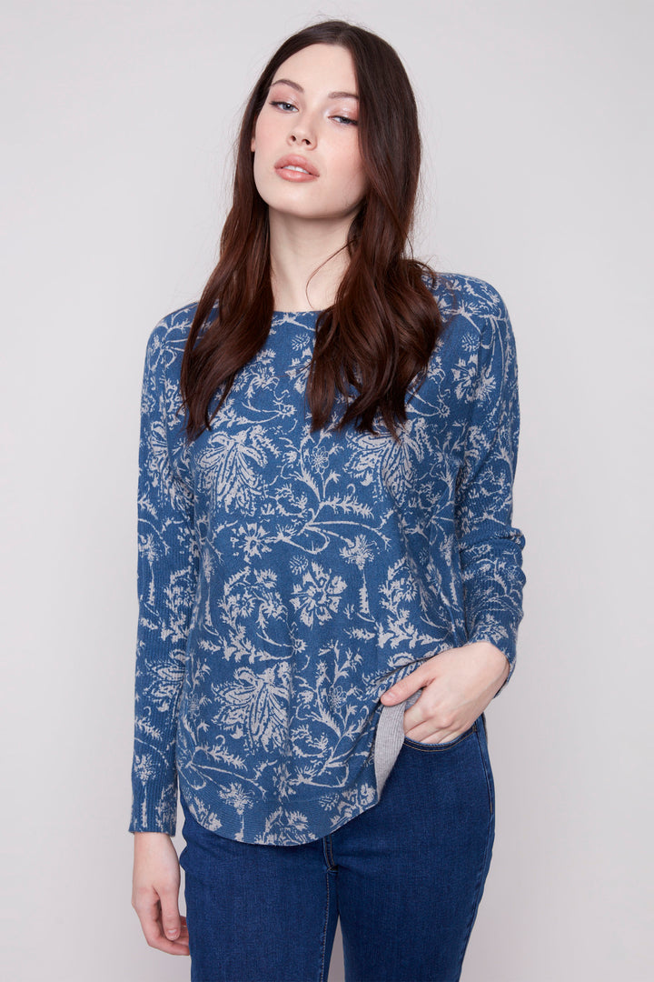 Charlie B Fall 2025 
With its crewneck and light sweater material, this top is perfect for transitional weather. The straight cut long sleeves provide comfort and versatility for any occasion.