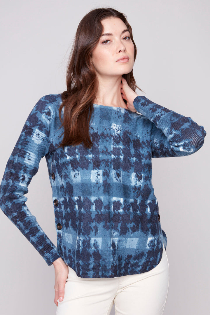 Charlie B Fall 2025 
Made with super plush and soft fabric, this light sweater top features long loose ribbed sleeves for a cozy fit. The neat tie dye abstract print adds a touch of wow! Elevate your wardrobe with this knit top!