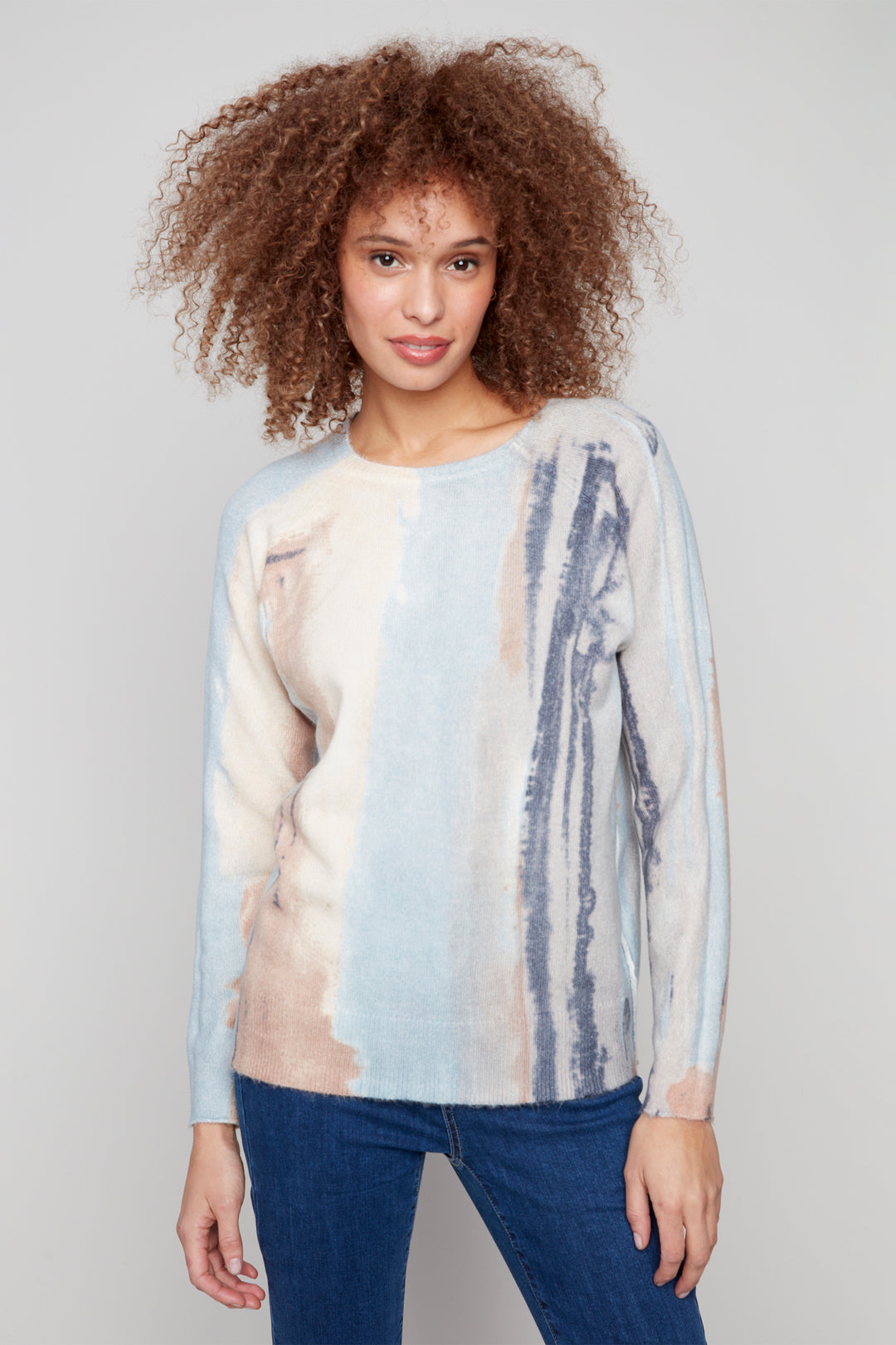 Charlie B Fall 2025 
 With a neat watercolour pattern and a reversible round neck sweater style, you can wear it one way one day and switch it up the next! 