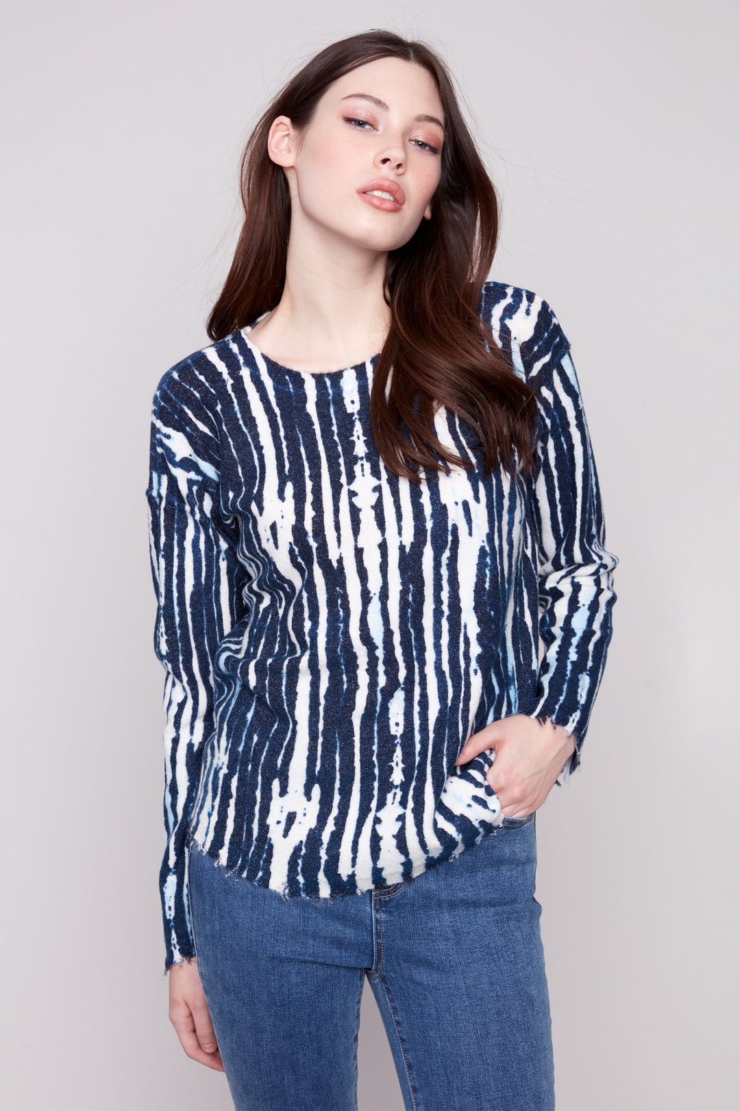 Charlie B Fall 2025 
With a neat abstract stream pattern and a reversible round neck sweater style, you can wear it one way one day and switch it up the next!