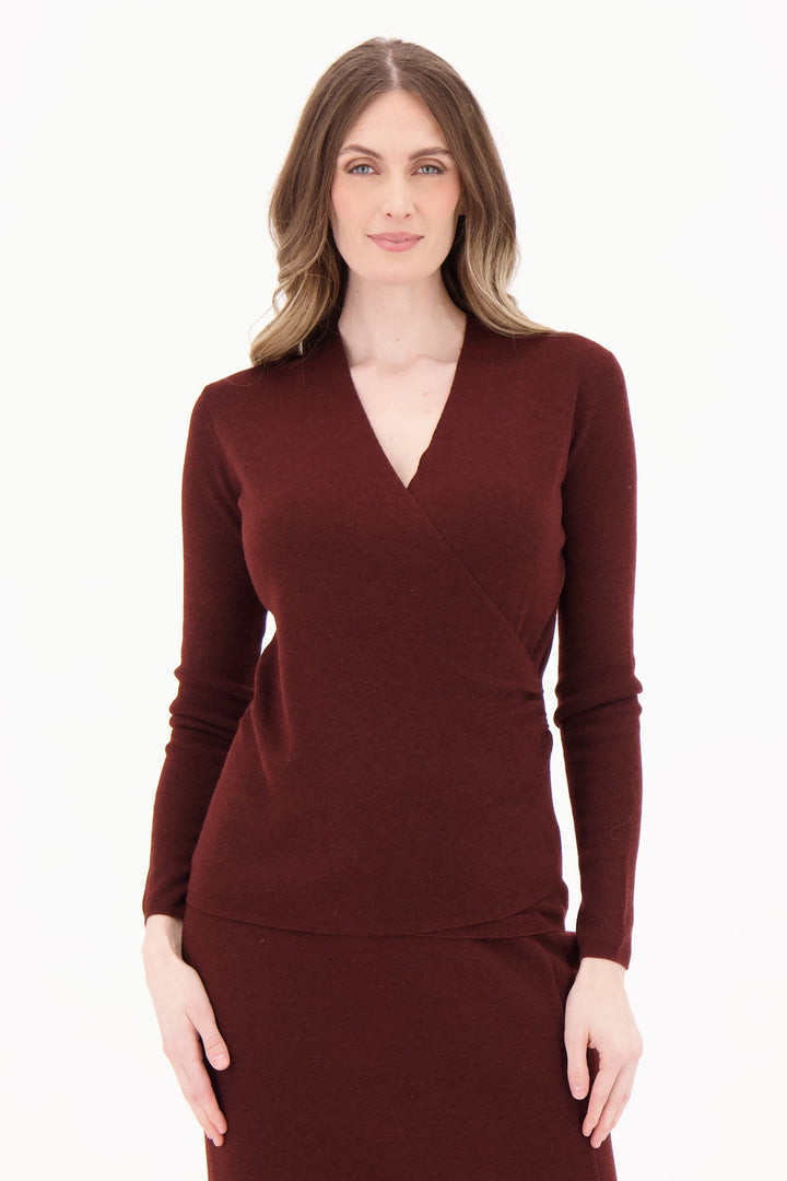 Spanner Fall 2025 
This wrap front sweater top features a chic, elegant design with a natural V-neck that flatters effortlessly. Crafted from a stretchy fabric blend in a soft sweater knit, it offers both comfort and style. 