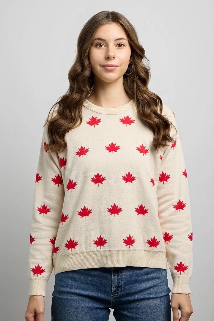 CANADA KNITWEAR Fall 2025 
Its crew neckline and soft cotton knit make it a dream to wear, while the playful maple leaves print adds a touch of autumn charm.