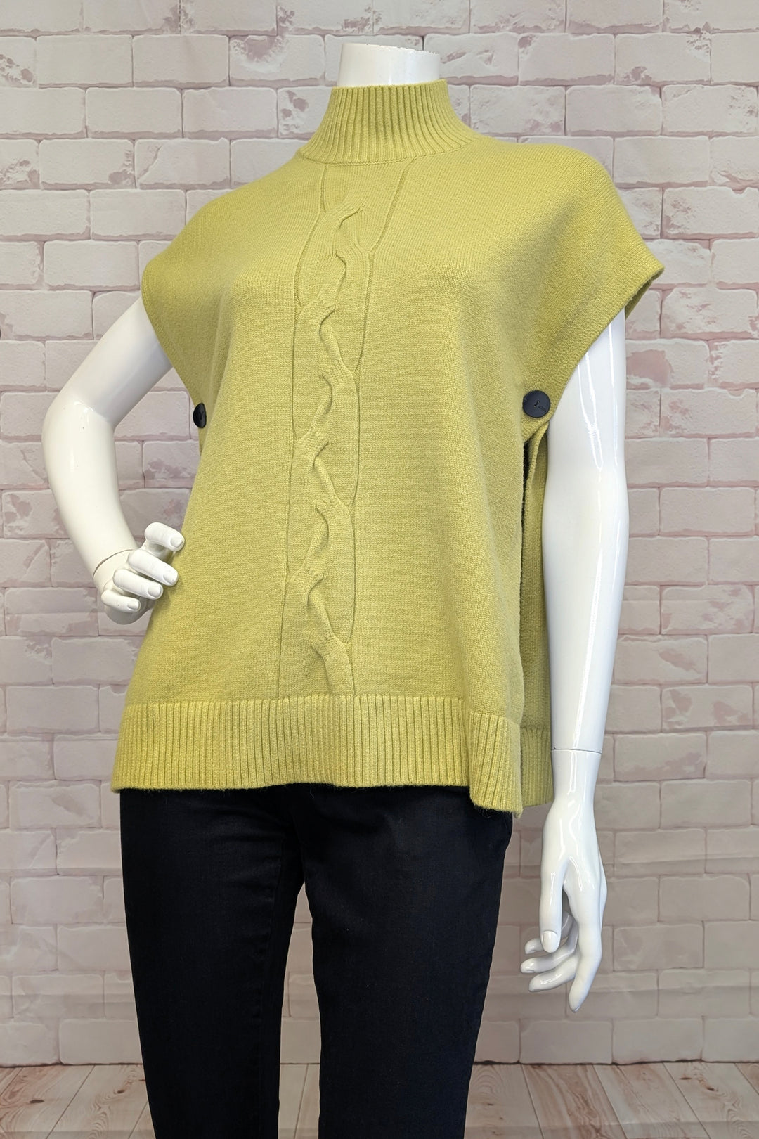 MARIE LA LUNE Fall 2025
Crafted from super soft, lightweight fabric, this mock neck vest poncho offers effortless elegance and comfort. Its distinctive crisscross cable knit design adorns the front, complemented by a flattering poncho silhouette with drop shoulders. 