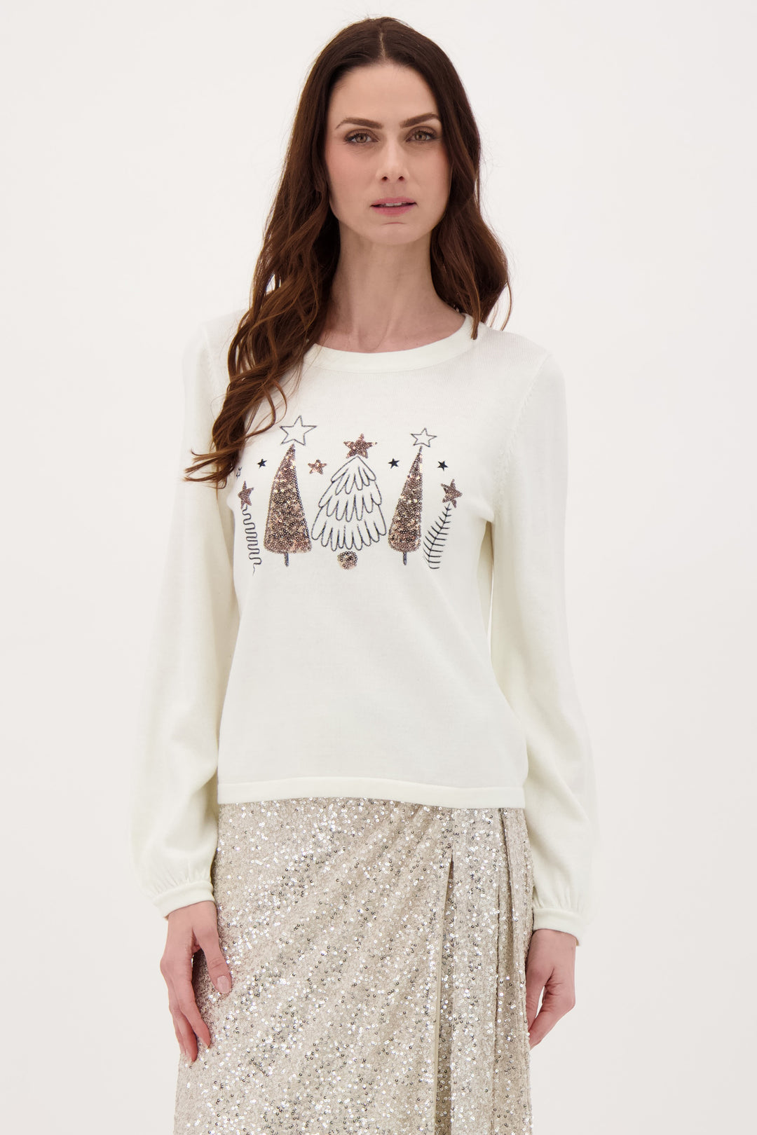 GABBY ISABELLA Fall 2025 
This festive crew neck sweater features stitched Christmas trees adorned with sparkling gold sequin stars for a holiday touch.