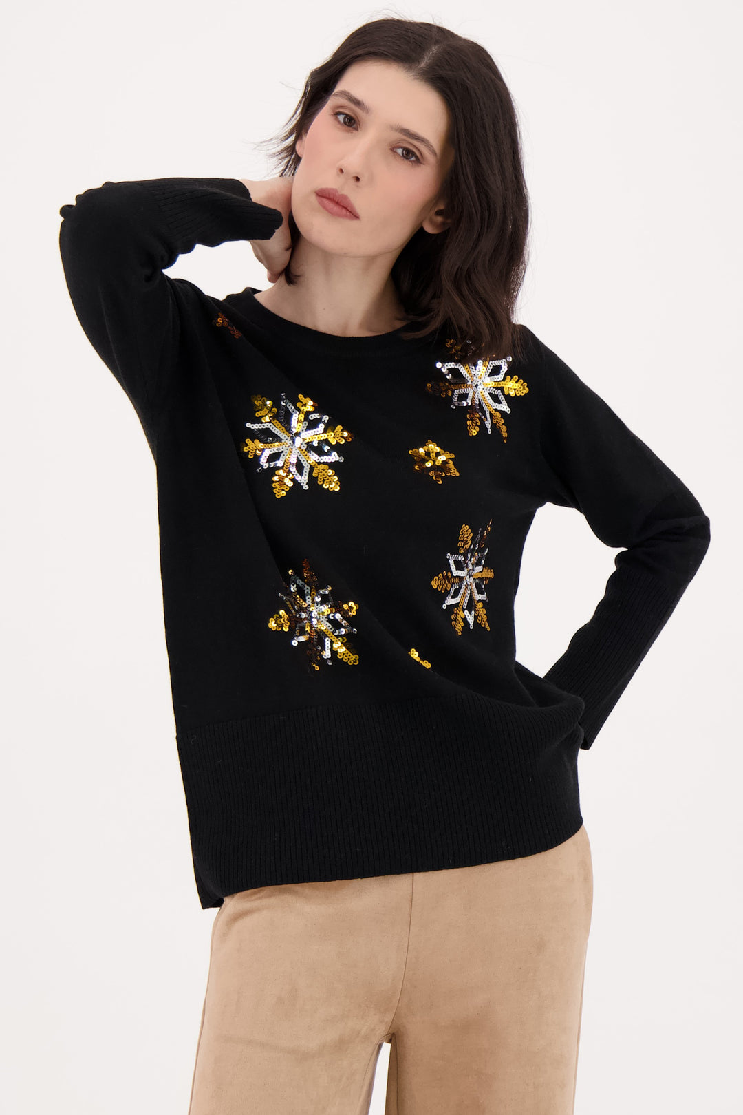 SPANNER Fall 2025 
This cozy crew sweater features a playful design with long ribbed hem and cuffs in the front, adding a stylish touch without the bulk.