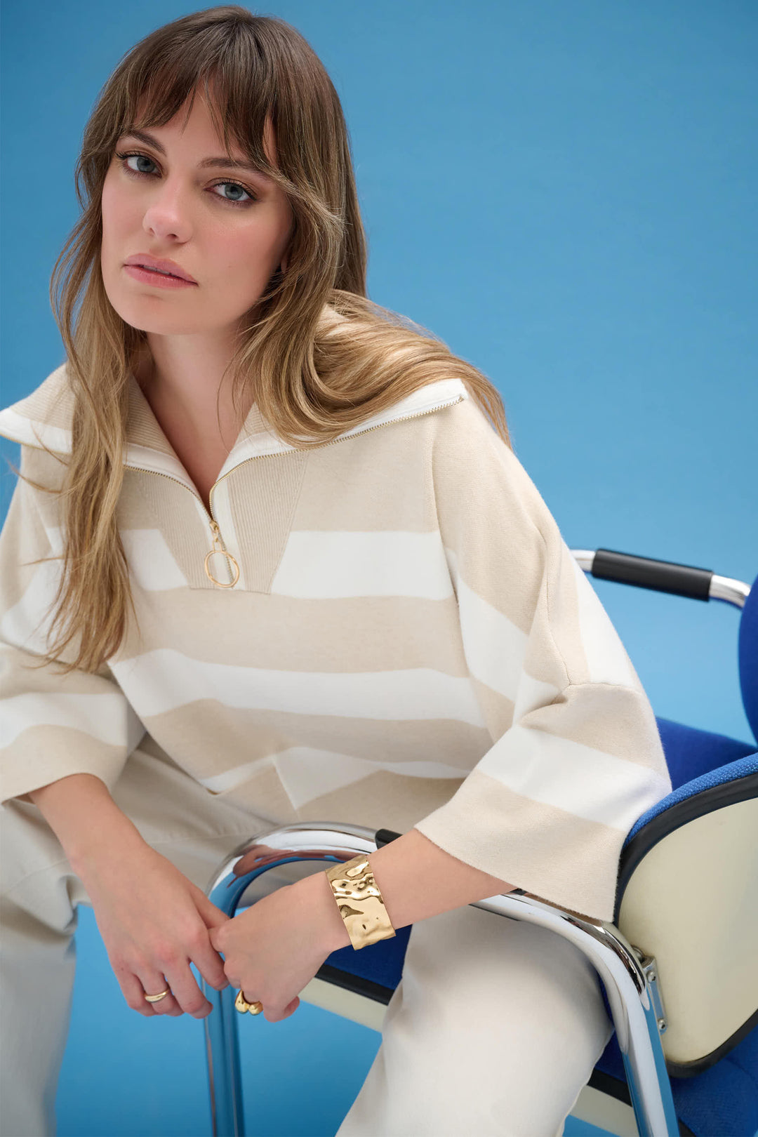 JOSEPH RIBKOFF Spring 2026 
This sophisticated yet smart casual sweater top features a neat stripe pattern and a flattering V-neck collar line. 