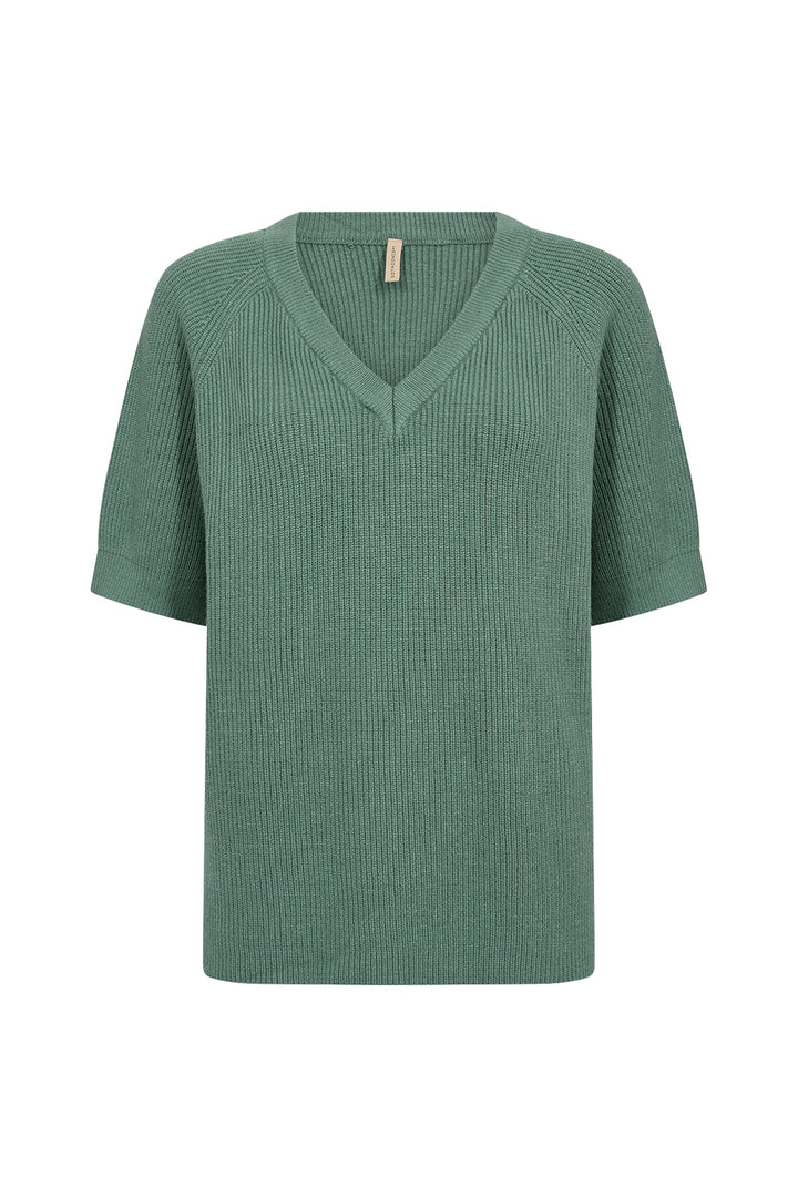 Green ribbed sweater on a white background