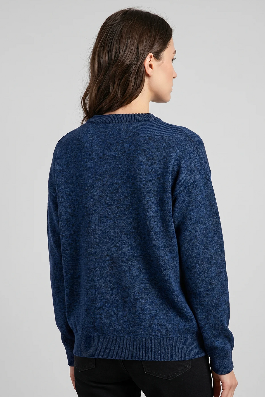 A woman shown from the back modelling a navy cotton long sleeve sweater. 