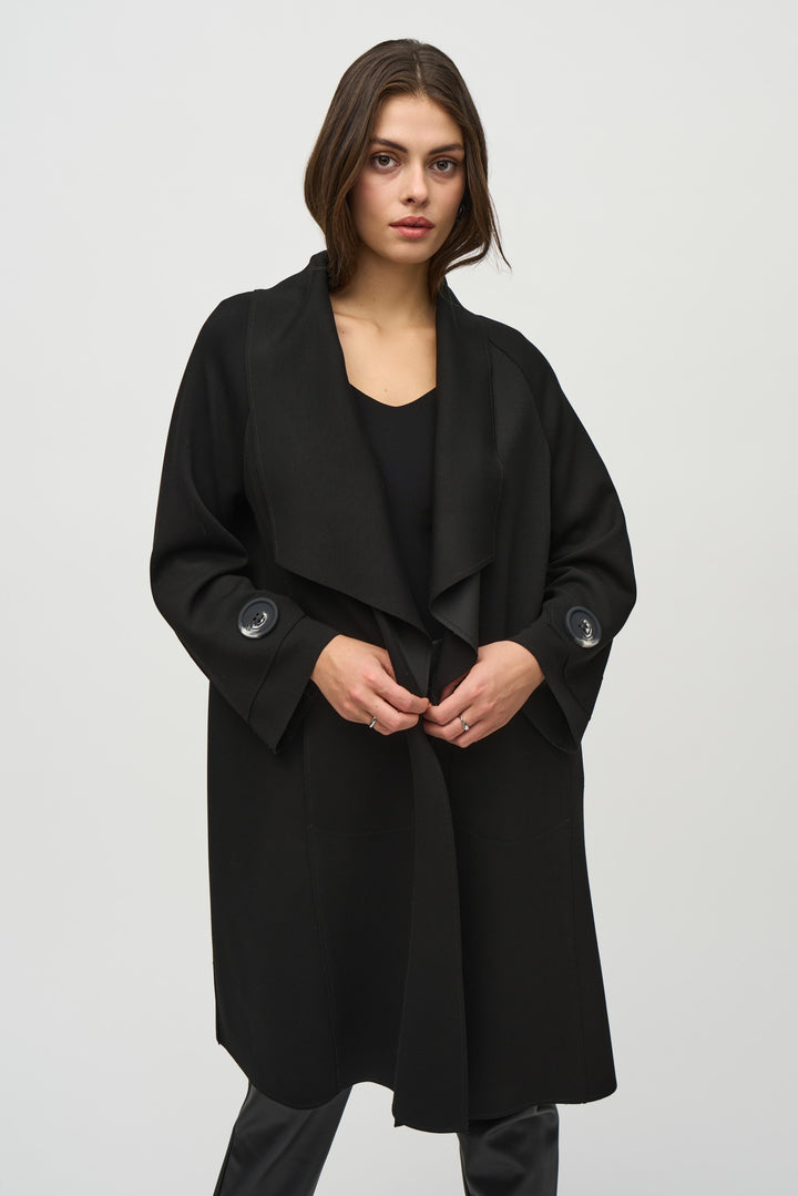 Joseph Ribkoff Fall 2024 The wide shawl collar and large button cuffs add a touch of elegance to the open front style, while the relaxed fit and tailored side pockets provide both comfort and functionality.