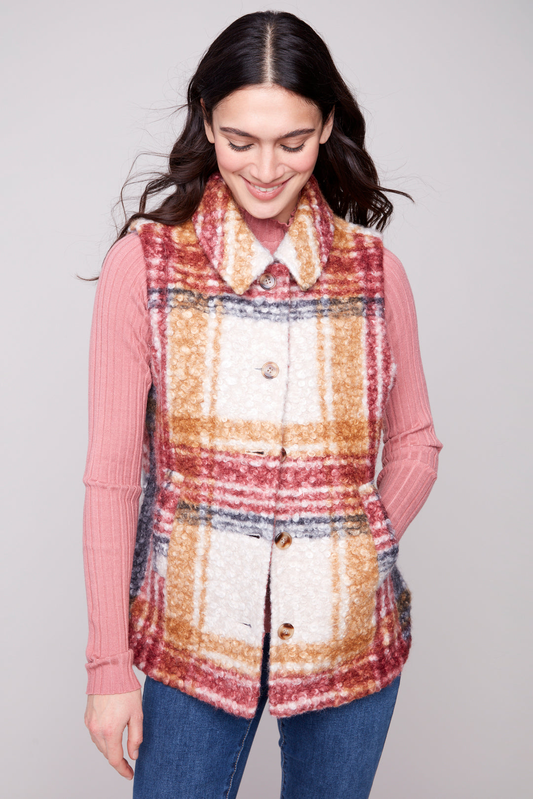 Charlie B Fall 2025 
The full front buttons and plaid design pattern add a touch of sophistication, while the side pockets offer convenient storage for small essentials.