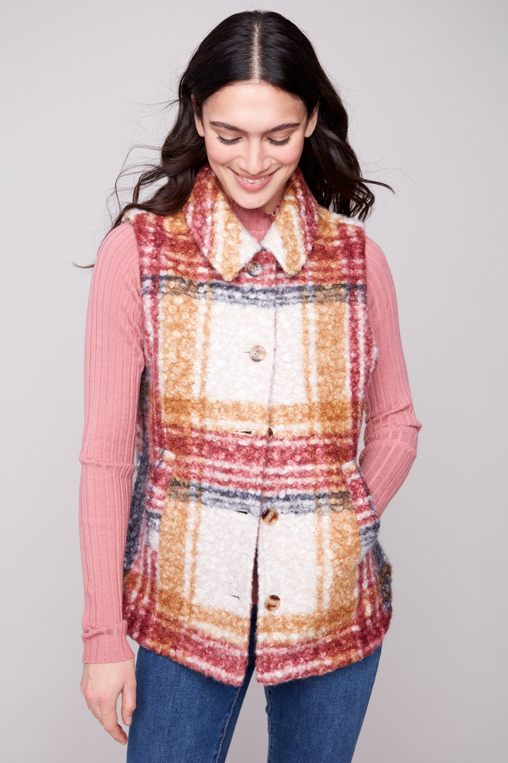 Charlie B Fall 2025 
The full front buttons and plaid design pattern add a touch of sophistication, while the side pockets offer convenient storage for small essentials.