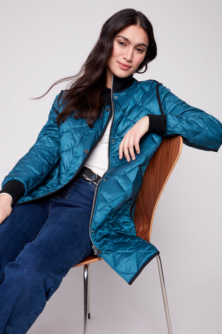 Charlie B Fall 2025 
Featuring a long quilted puffer style, rib knit zipper-front closure and pockets, all in a bold, bright, vintage fall colours!