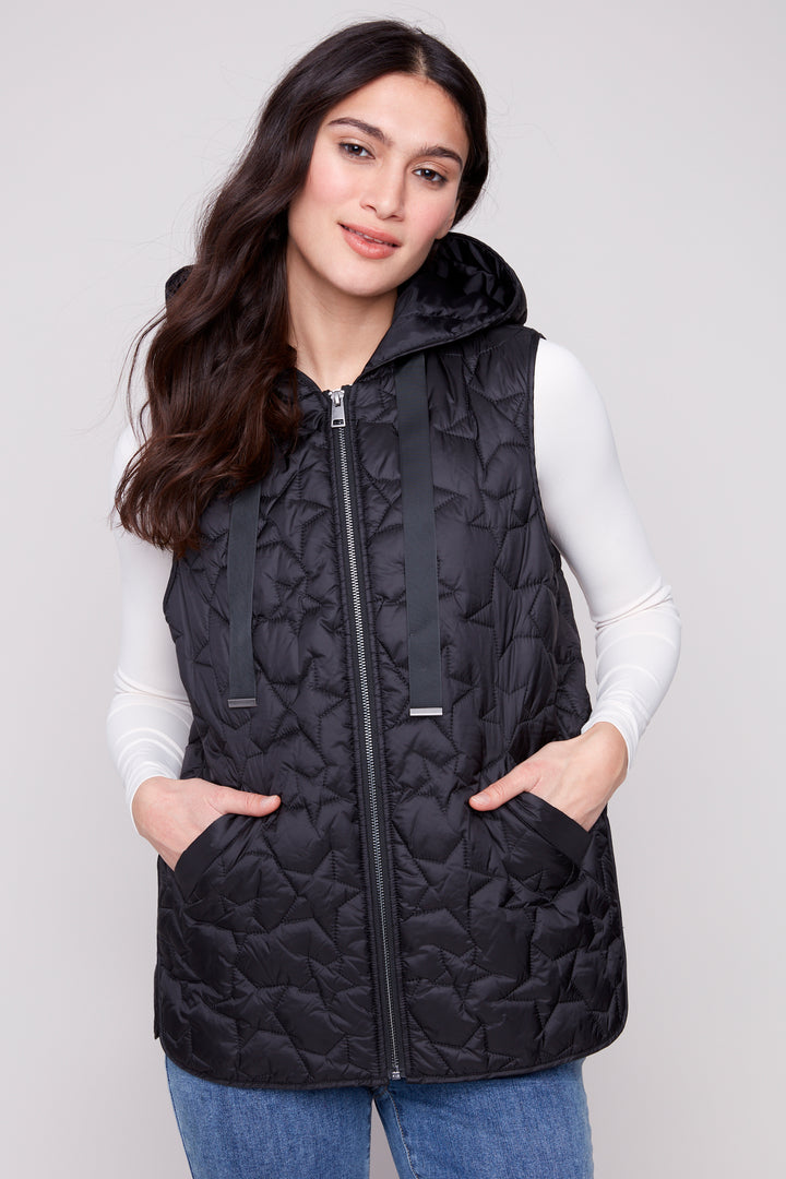 Charlie B Fall 2025 
Inspired by stars and warmth, the all new Star Quilted Hoodie Vest features a cute mini stars print on quilted fabric. Perfect for chilly days, this vest has a front zipper and a cozy drawstring hood for extra comfort.