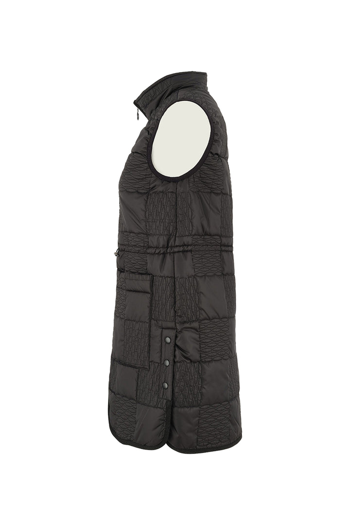 Black quilted vest with a white circle on a white background