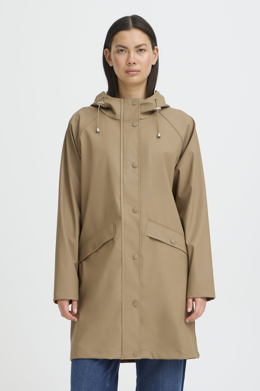 Waterproof raincoat with buttons and hood. 