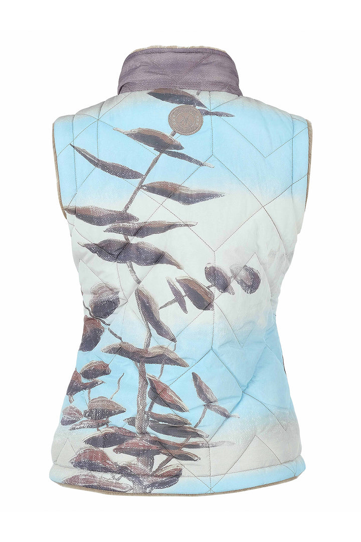 A sleeveless quilted vest with a high collar, featuring a printed design of brown eucalyptus branches against a light blue and white background, shown on a plain white studio background.