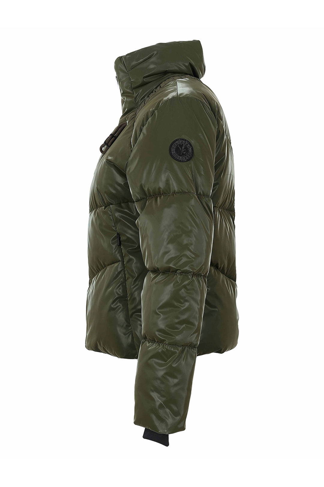 An olive green puffer jacket shown from a side profile view against a plain white background. The jacket features horizontal quilting, a high collar, and a circular black logo patch on the upper left sleeve.