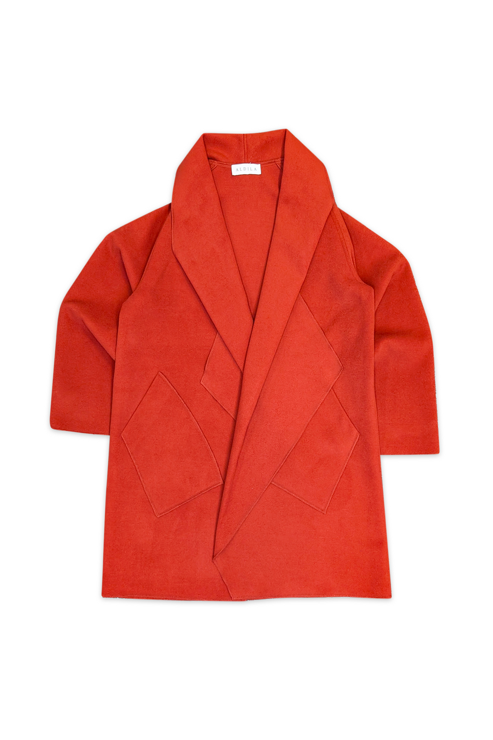 Brick coloured coat on a white background