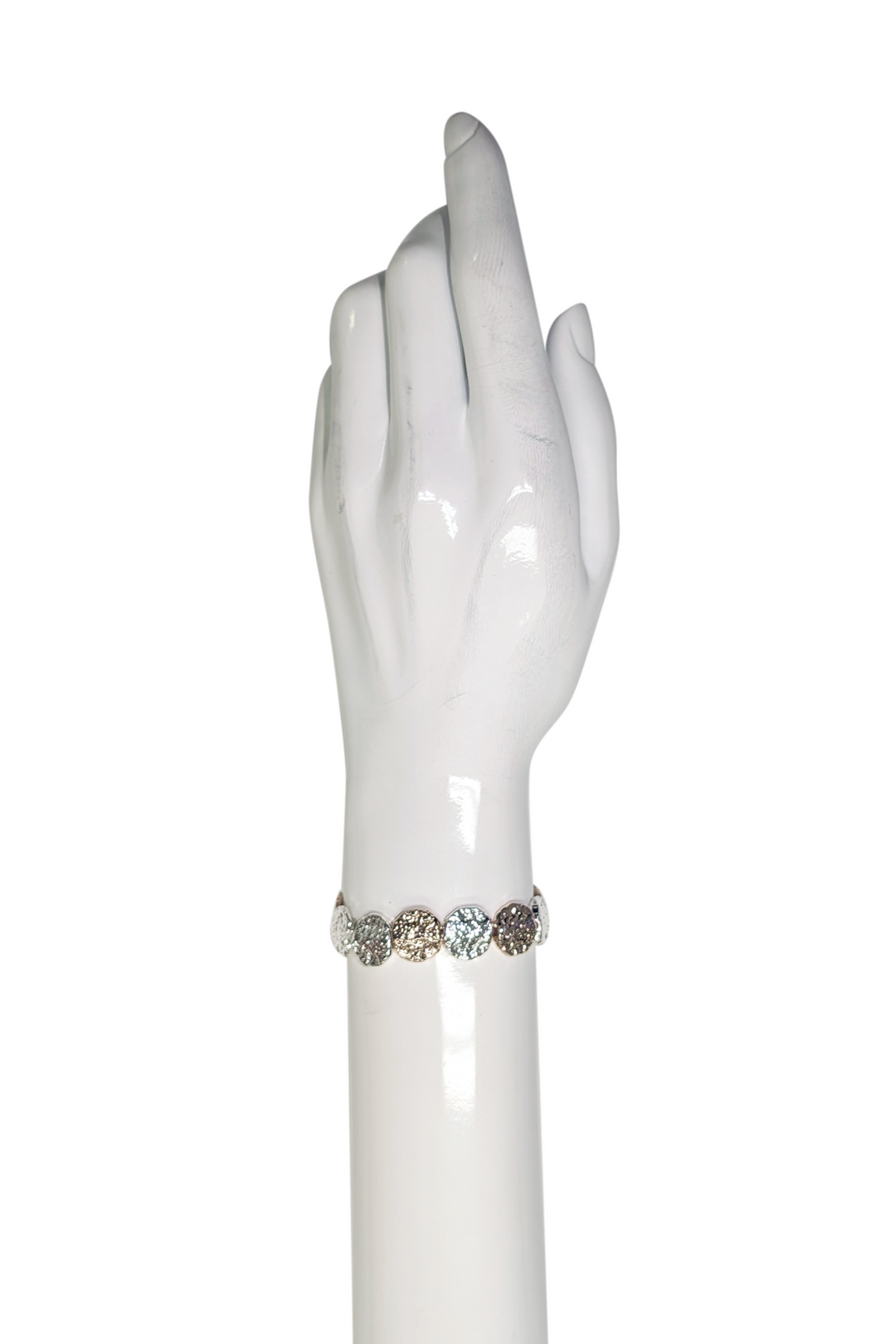 Textured circles bracelet on a wrist 