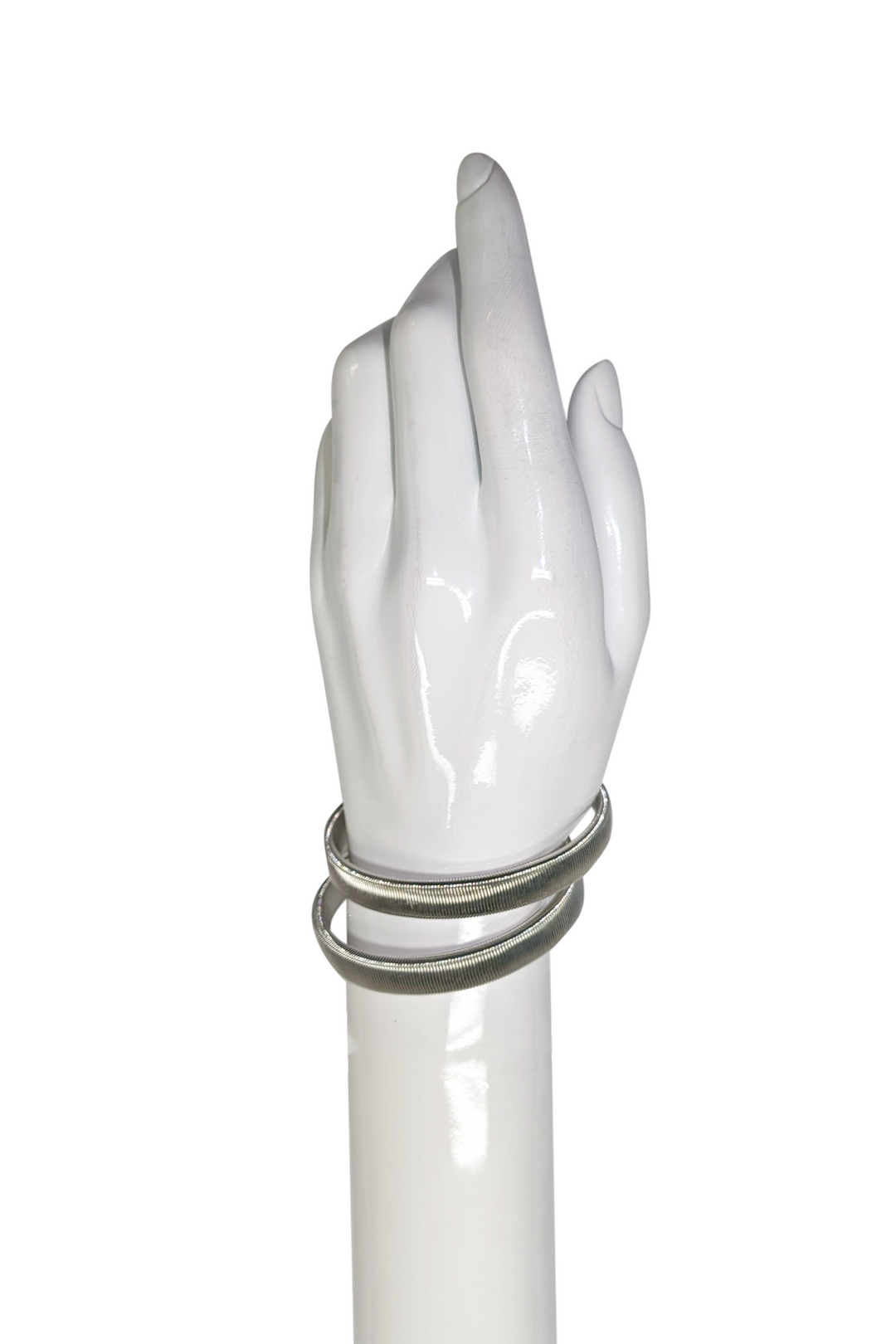 Sleeve garter on wrist on a white backdrop. 