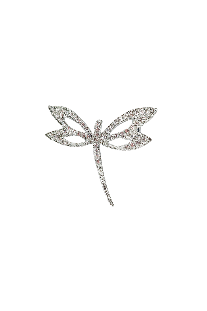 Silver dragon-fly-shaped brooch lapel pin with crystal gemstones on a white background