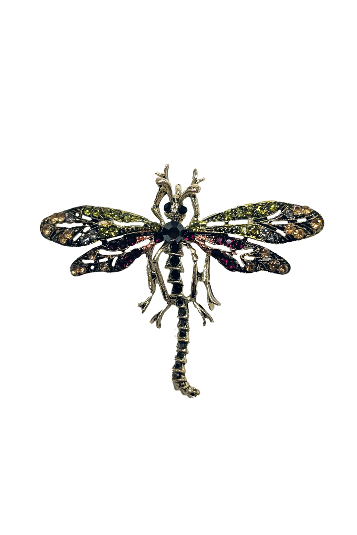 Green dragon-fly-shaped brooch lapel pin with crystal gemstones on a white background