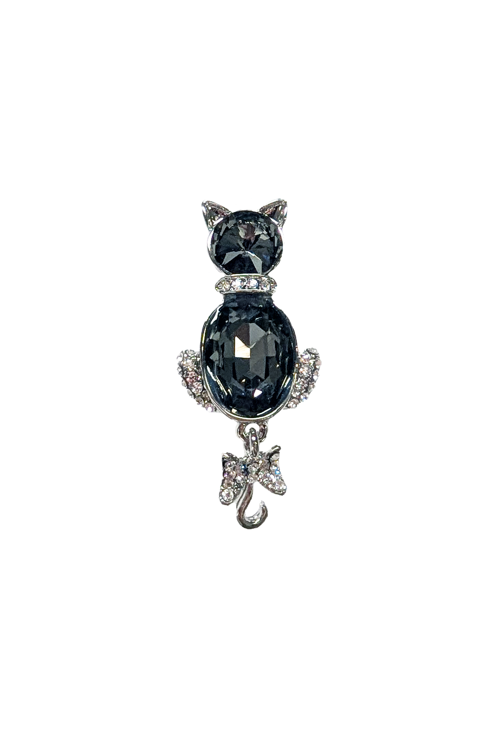 Cat-shaped brooch with a large black gemstone and a smaller clear gemstone on a white background