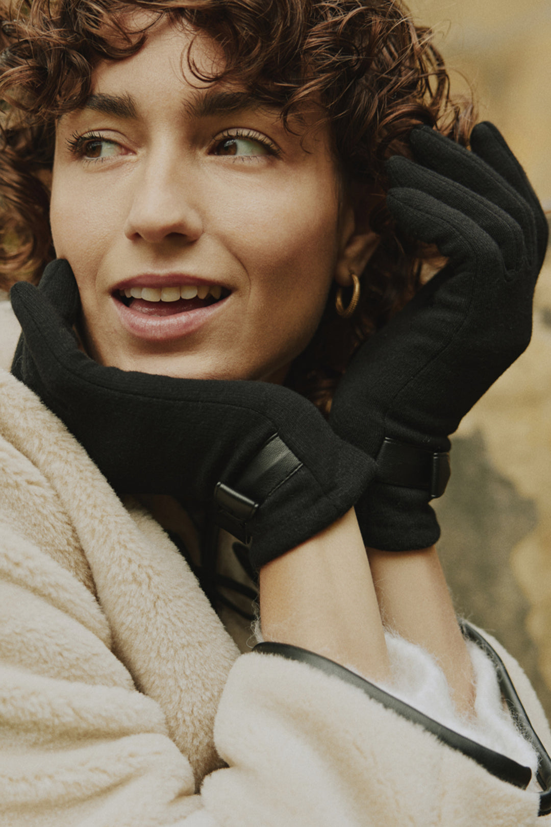 B. Young Fall 2025 
These driving gloves feature a charming bow at the wrist and are crafted from stretch fabric with a cozy fleece lining, ensuring comfort and warmth all day long.