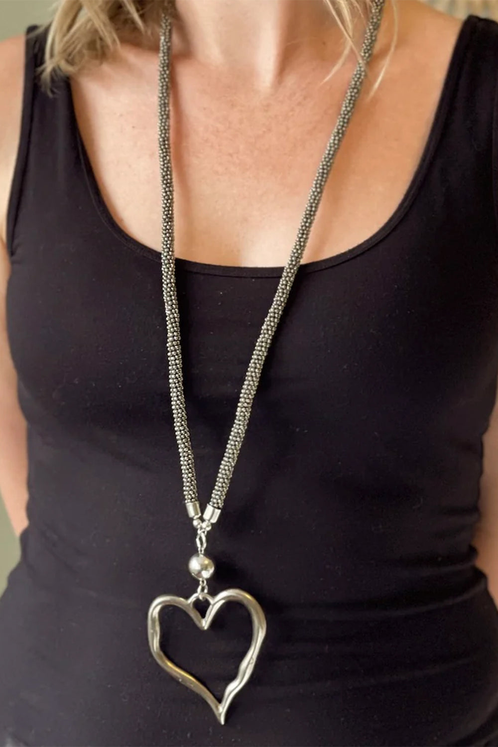 SUZIE BLUE Fall 2025 
Handcrafted beaded necklace featuring an adorable open heart pendant—the perfect everyday accessory that combines natural charm with effortless style.