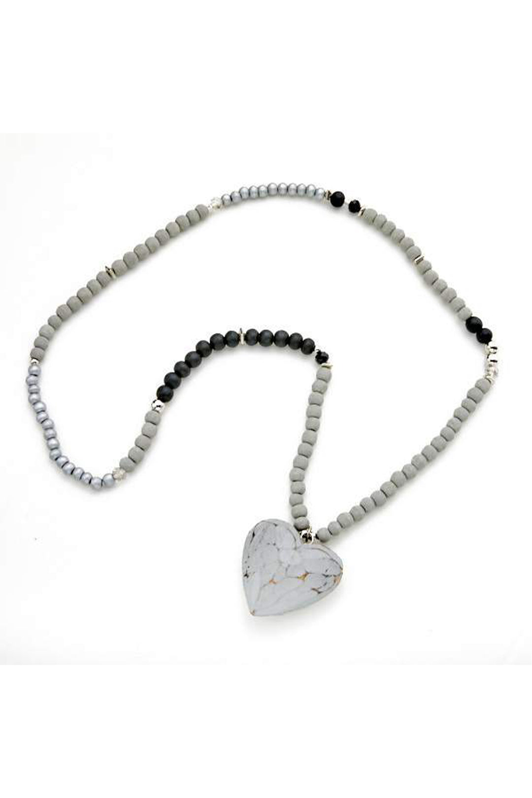 SUZIE BLUE Fall 2025 
Handcrafted with care, this wooden heart necklace combines natural charm with versatile style. Each piece features delicate beads and a beautifully carved wooden heart that pairs effortlessly with any outfit.