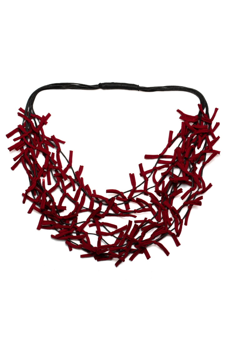 Red necklace on a white background