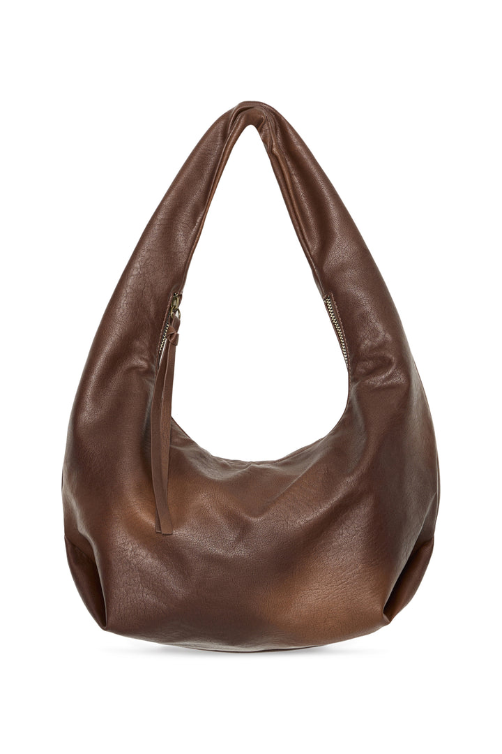 Brown leather handbag on a white background