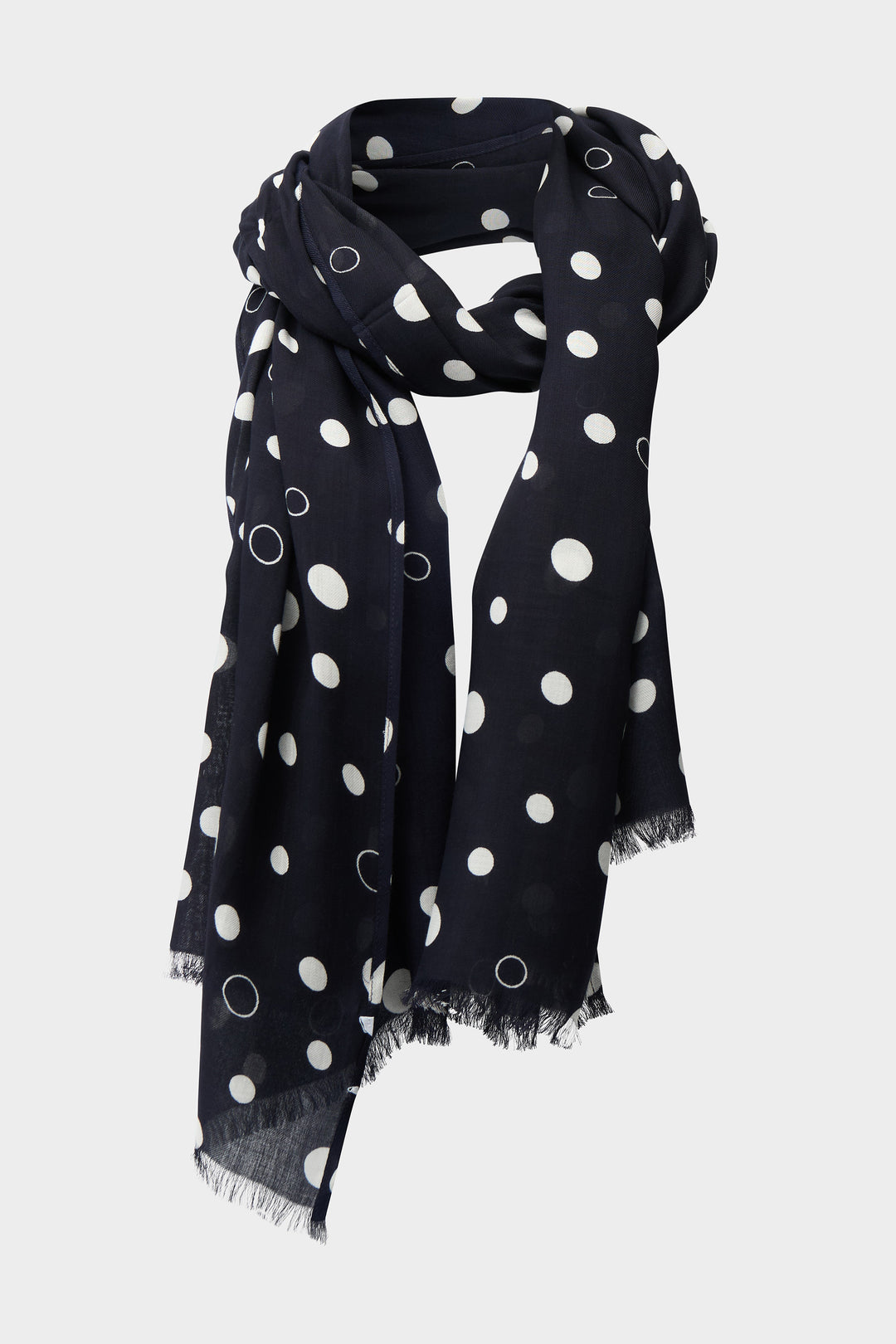 Black polka dot scarf on a white background