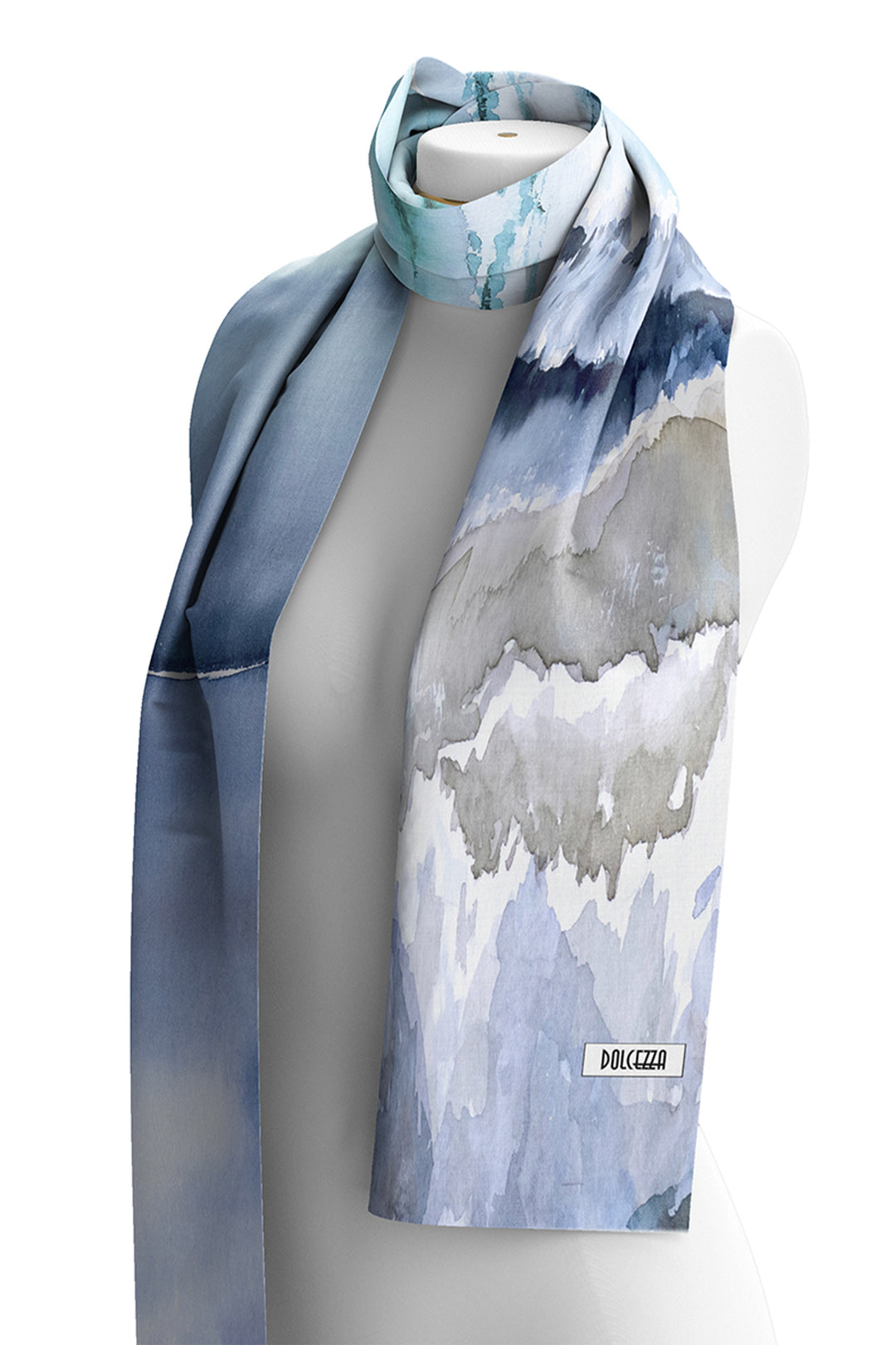 Scarf with a blue and gray abstract pattern on a mannequin against a white background