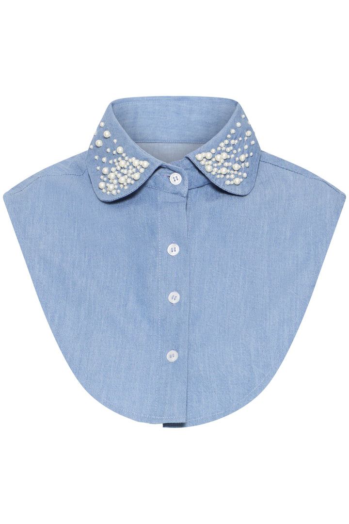 Blue denim collar with decorative white trim on a white background