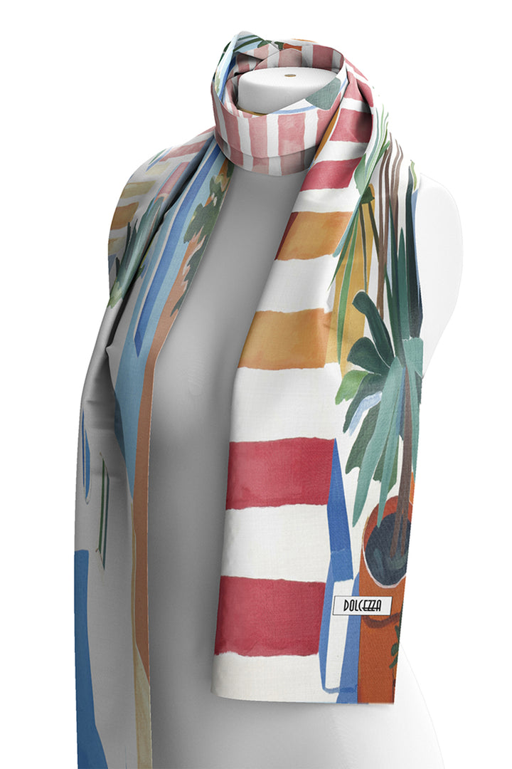 Colorful scarf with tropical patterns on a white background