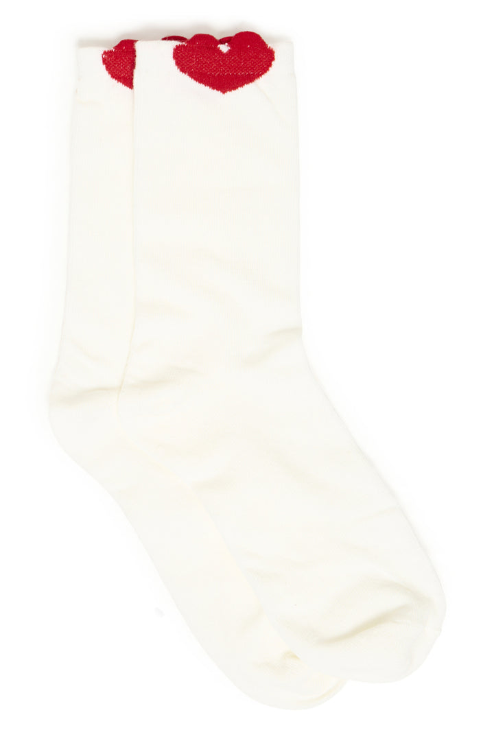 White sock with red heart design on a white background