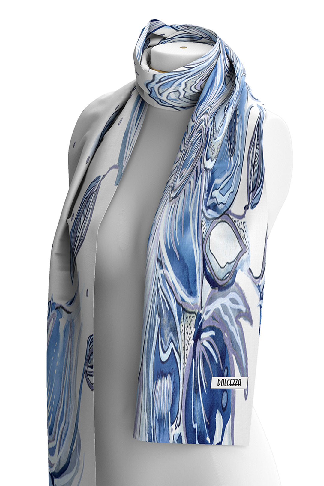 Blue and white patterned scarf on a mannequin with Dolce&Gabbana label.