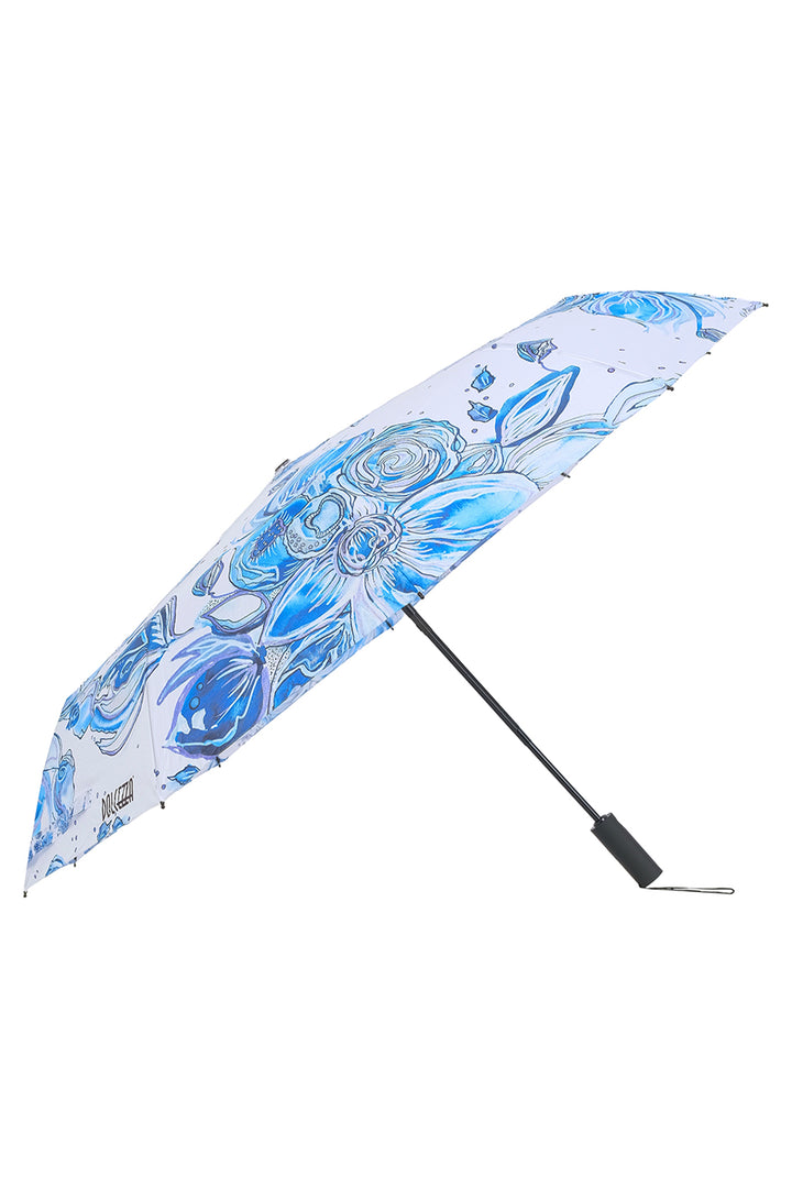 Blue and white floral patterned umbrella on a white background
