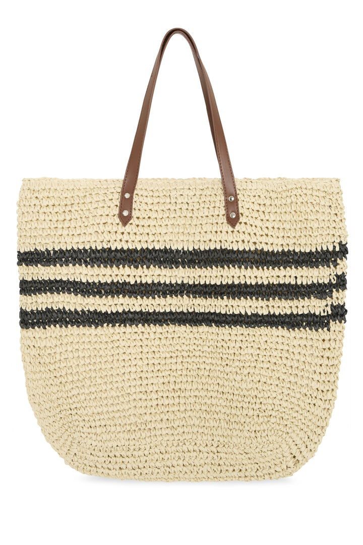 Woven straw tote bag with brown leather handles on a white background