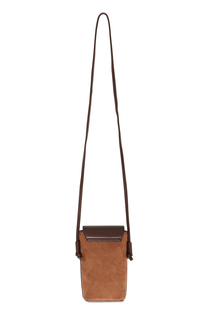 A brown suede crossbody bag with a dark brown leather flap and matching shoulder strap, shown against a plain white background.