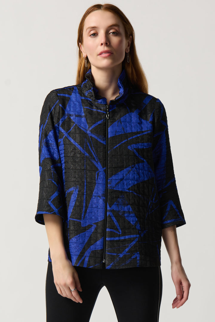 Crafted with 3/4 cuffed sleeves and a front zipper with a shirred collar, this stunning trapeze jacket boasts a geometric print to create volume and dimension overall.