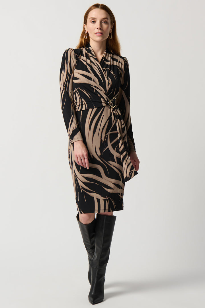 Featuring an all-over artistic 'tiger like' print and a metallic buckle, this dress will show everyone your wild side in a tasteful fashion piece. 
