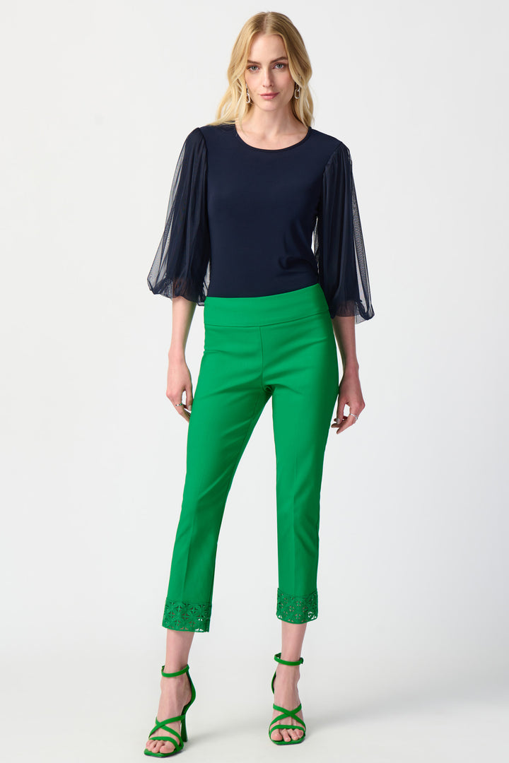 This fitted pant features a trendy crop length and an elastic waist for easy slip on. 
